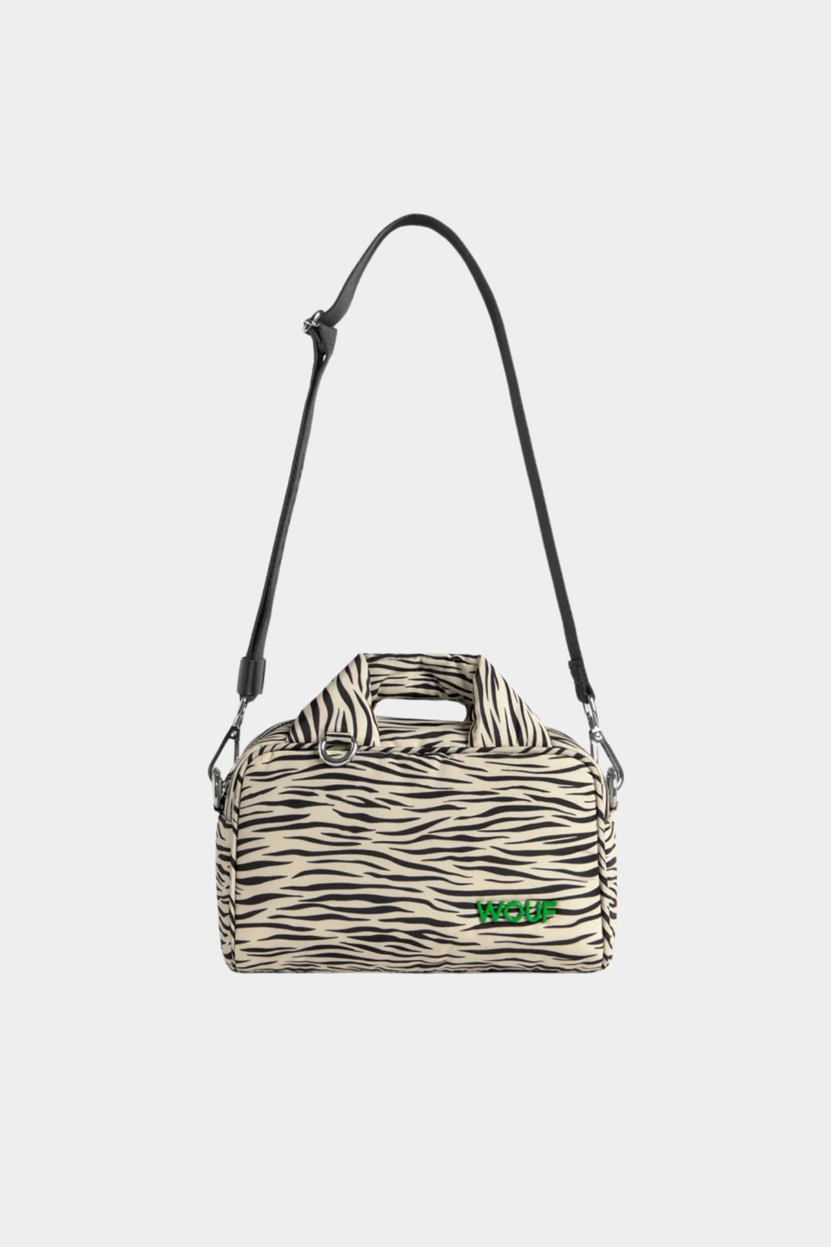 Bolso bowling Wouf Zebra Hit con estampado de cebra beige y negro, asas acolchadas y correa extraíble