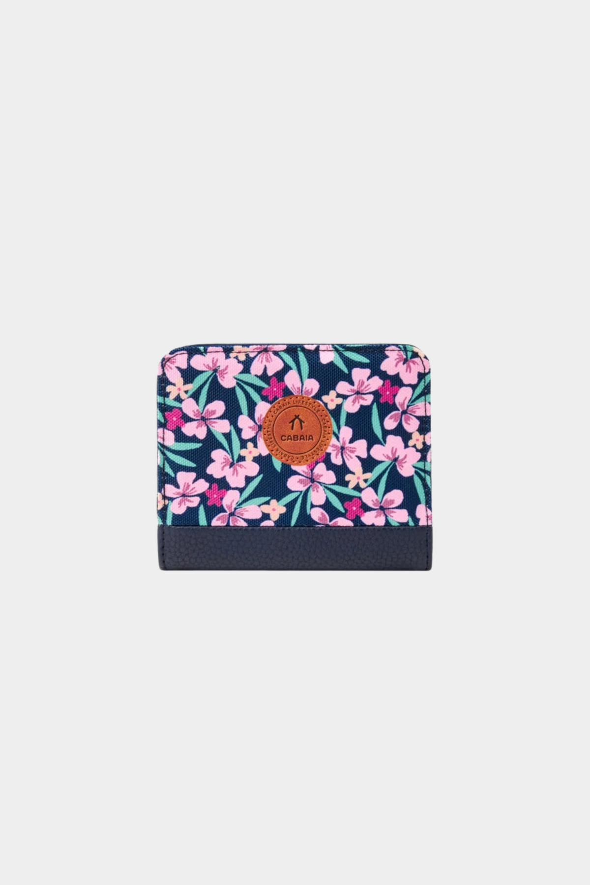Cartera Small Cagliari de Cabaia con estampado floral rosa y verde sobre fondo púrpura y cierre de cremallera