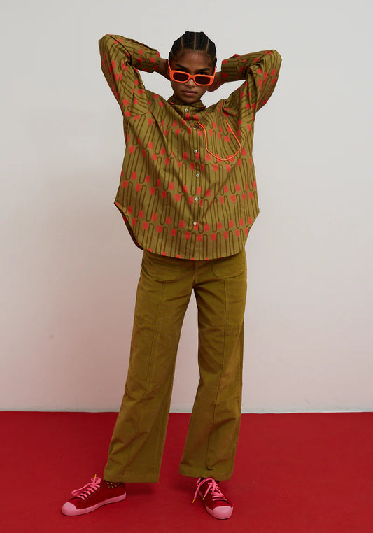 Pantalón Destiny oro de Dr. Bloom de terciopelo con corte recto y costuras verticales