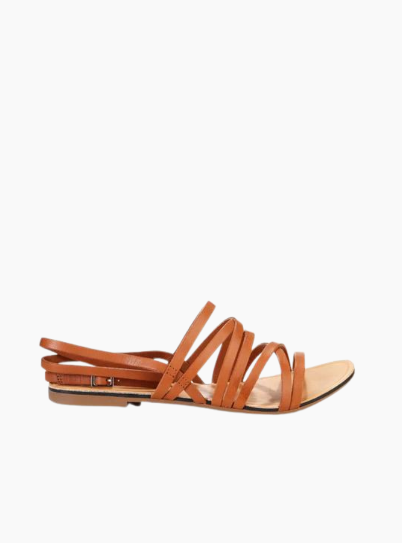 Sandalias planas Vagabond Tia Griega Saddle de piel marrón para mujer con tiras finas y cierre ajustable.