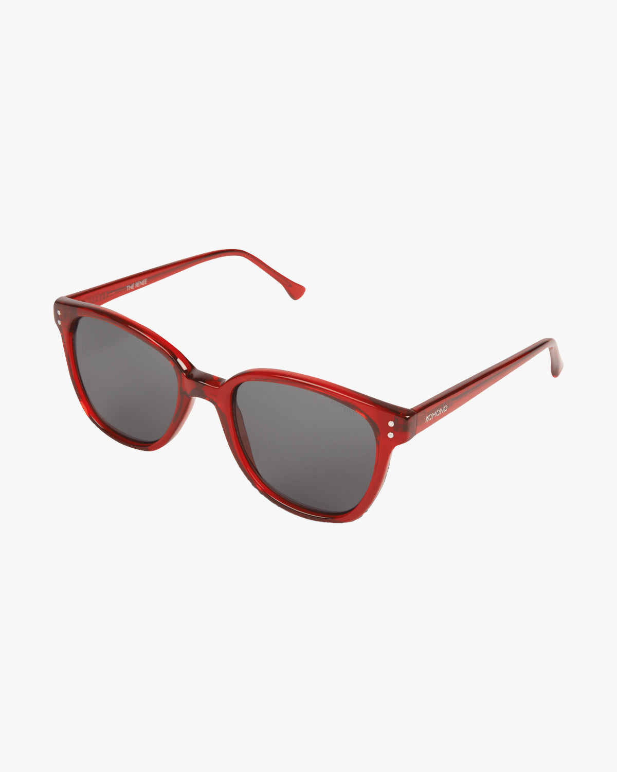 Gafas de sol Renee Ruby de Komono con montura roja translúcida y lentes ahumadas