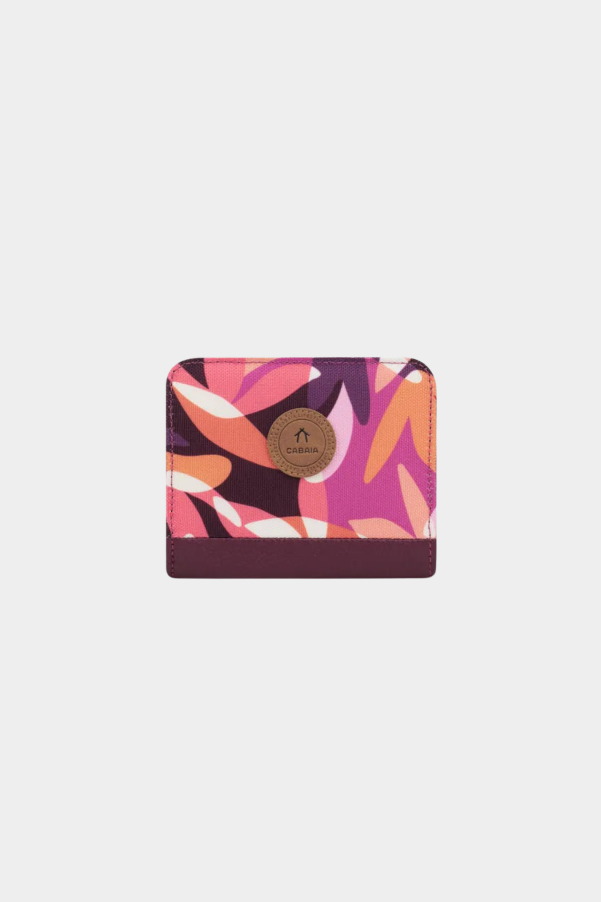 Cartera Small Montreuil de Cabaia en burdeos con estampado gráfico rosa, naranja y crema sobre fondo oscuro