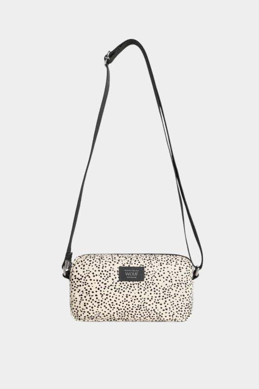 Mini bolso bandolera Wouf Panna en beige y negro, con microestampado, correa ajustable y cierre de cremallera